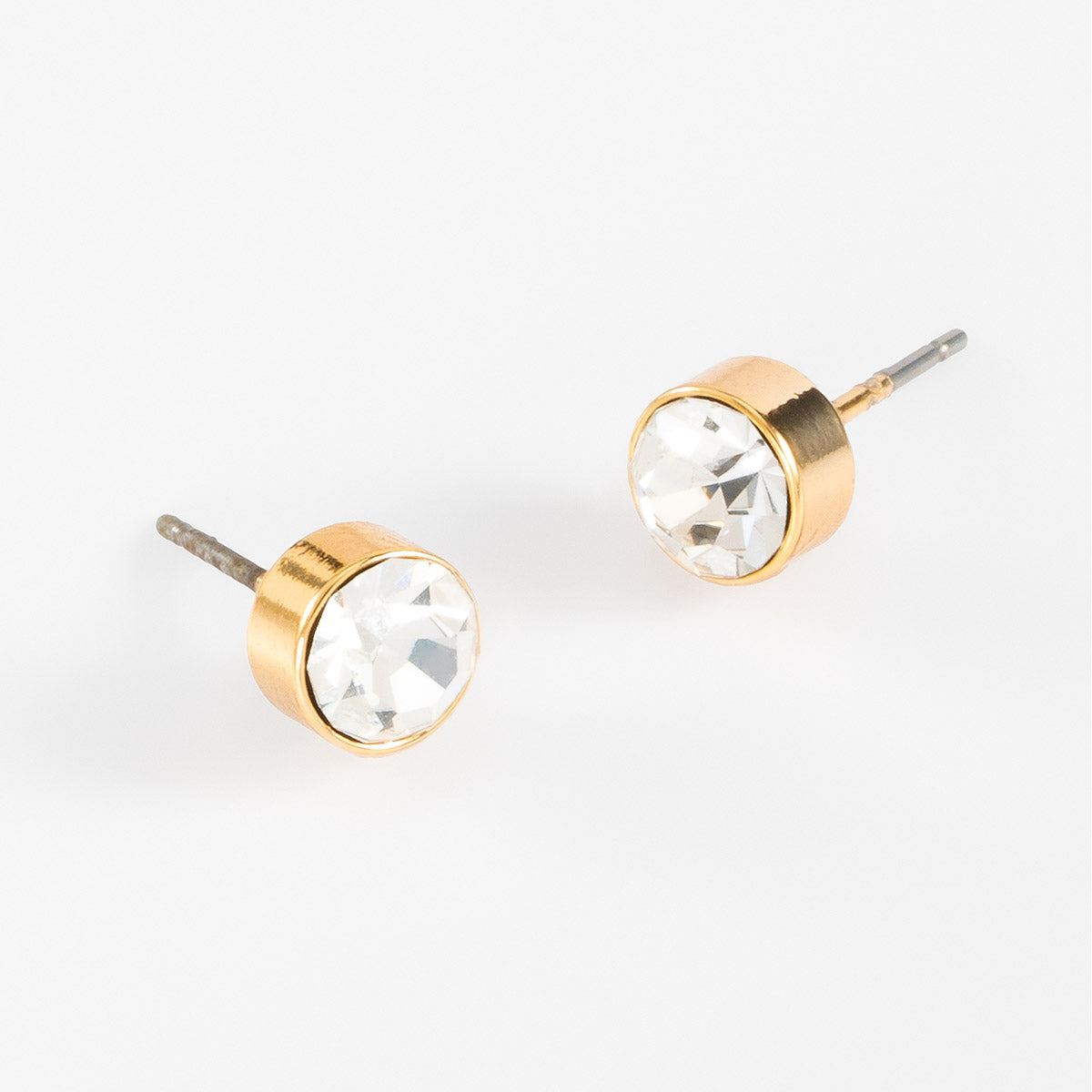 Aretes tipo botón con baño de oro y cristal, foto 2 de 5